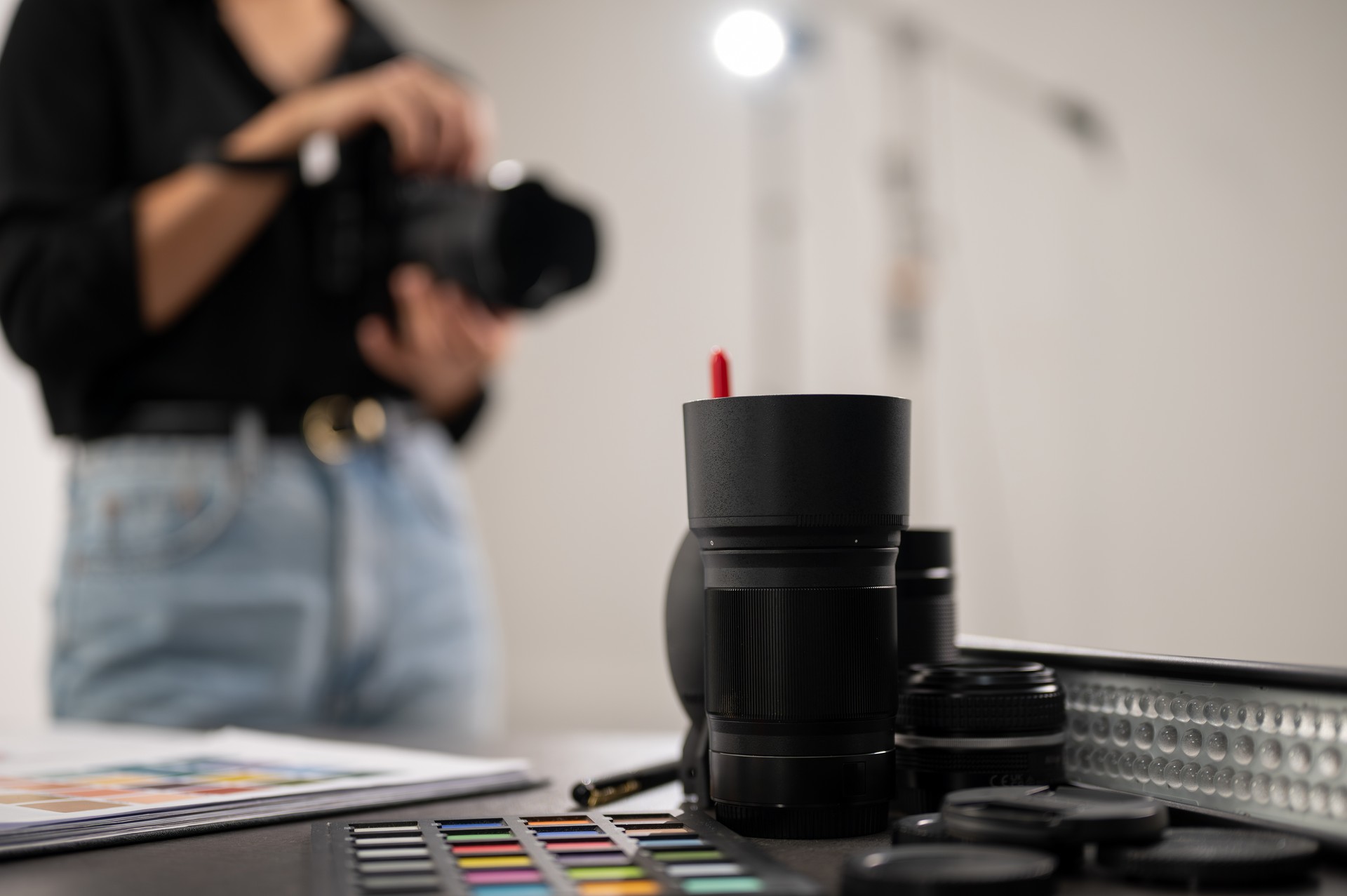 A close-up image of professional shooting equipment on a table in a studio. selective focus image